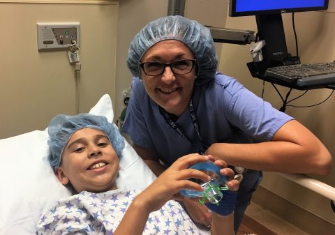 Sacred Heart Child Life Specialist with a smiling young patient