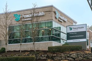 Exterior photo of PeaceHealth Camas clinic entrance and sign
