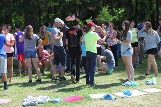 A group of volunteers gathered in a park