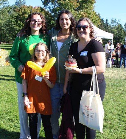 A family attending the 25th anniversary of the NICU celebration