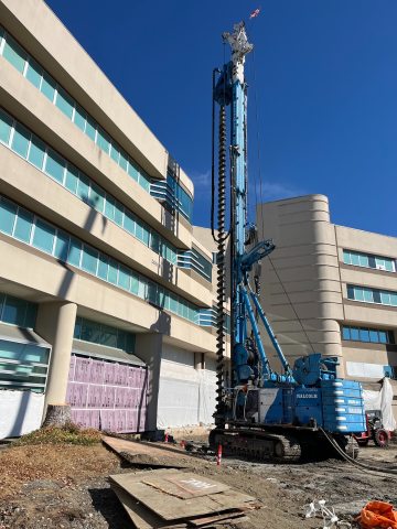 Construction vehicles working on the grounds of St. Joseph Medical Center