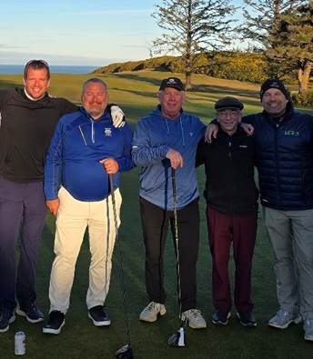 Byron at Bandon Dunes Golf Resort with his sons.