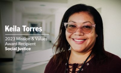 Keila Torres standing inside the hallway of a hospital