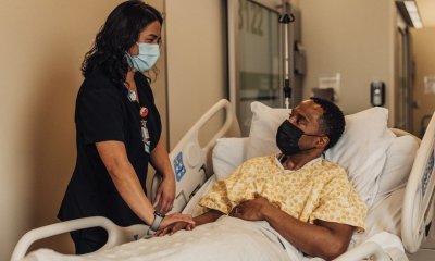 Nurse talking to hospital patient
