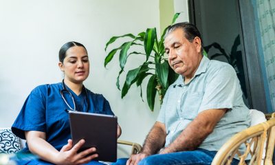 Person talking to their doctor at an appointment.