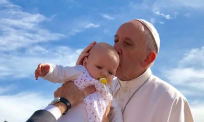 Pope Francis blesses baby
