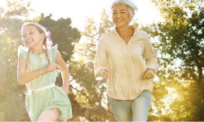 young girl running with woman