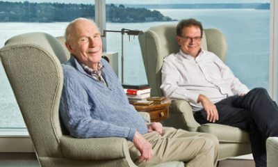 Alec Brindle Sr and Alec Brindle Jr relax in their home in Seattle