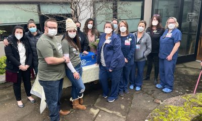 Group of people with Cuddle Cot donation