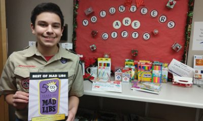 Zach Godoy shows off items for activity cart