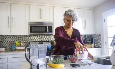Woman making a smoothie