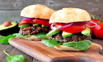 black bean burger with tomato, onion, lettuce and avocado