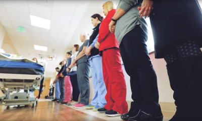 caregivers gather in hall to honor patient donor
