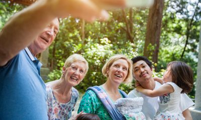 A group of family members smile for a photo