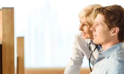 Provider and patient looking at something and being amused