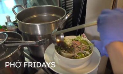 Khanh Tranh serves a bowl of pho, Vietnamese soup