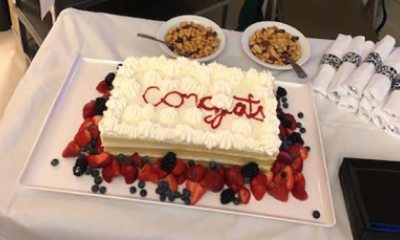 white wedding cake with fresh berries