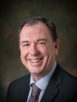 Head shot of Jason Hawkins, CAO of PeaceHealth Peace Harbor Medical Center