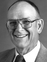 Portrait of a smiling man in black and white