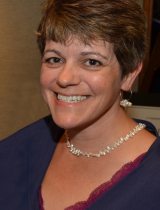 Candid photo of smiling Karen Santangelo