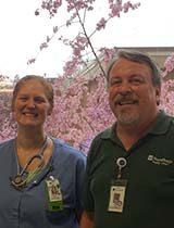 Two clinicians smiling