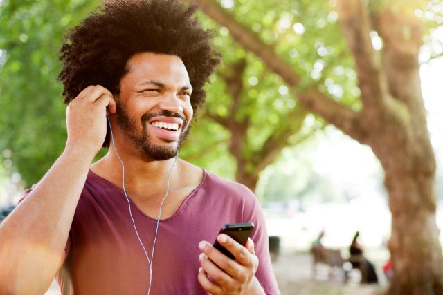Man listening to music with headphones.