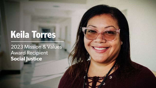 Keila Torres standing inside the hallway of a hospital