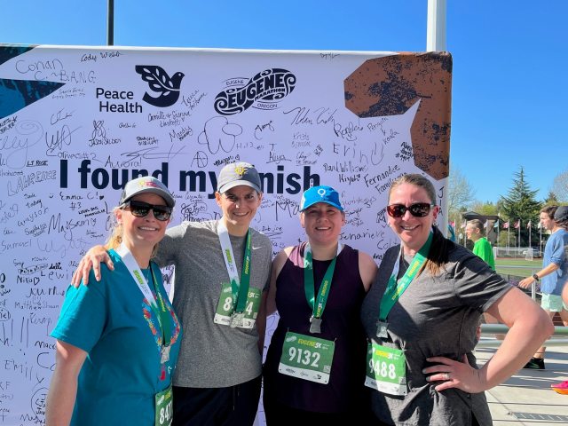 Sacred Heart Foundation team caregivers Kim Johannsen, Alexa Sharps, Erika Swanson and Amy Quiring at the 2023 Eugene Marathon.