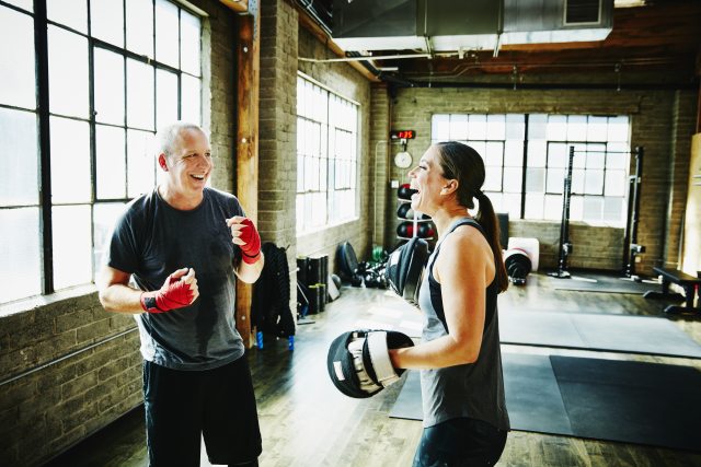 Two people boxing