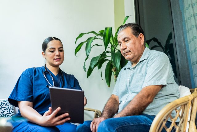 Person talking to their doctor at an appointment.