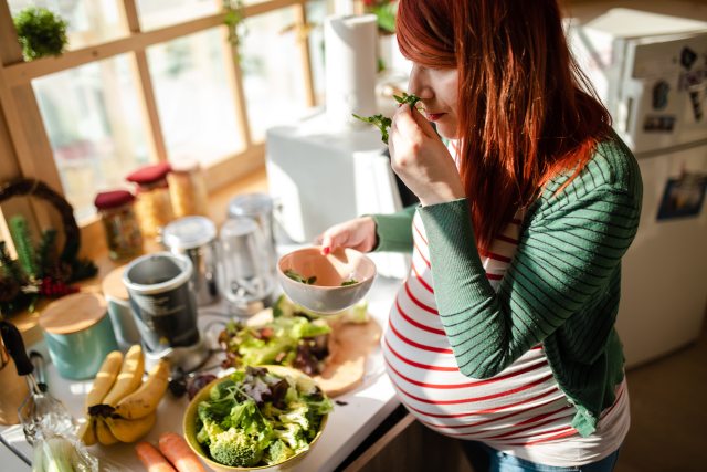 Woman making a salad