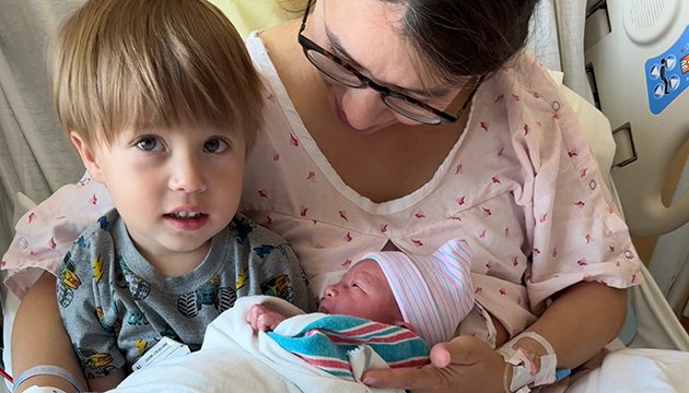 Big brother, baby and mom