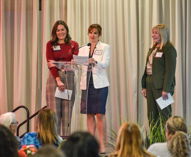 Three women presenting at the Women of Peace event