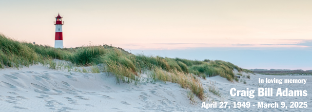 A photo of a beach with a lighthouse