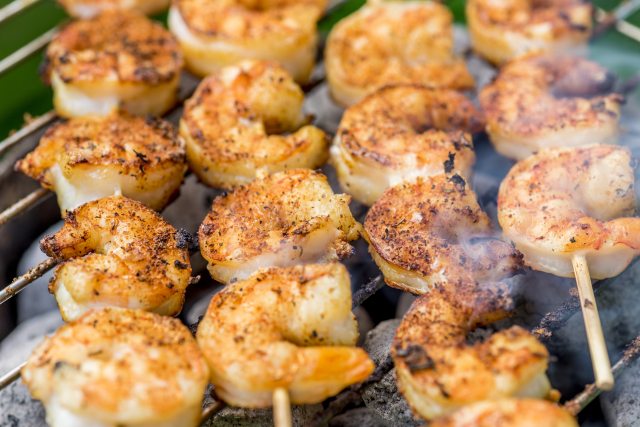 Shrimp skewers on a grill