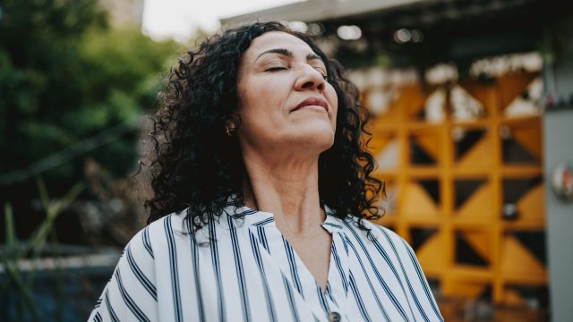 woman deep breathing 