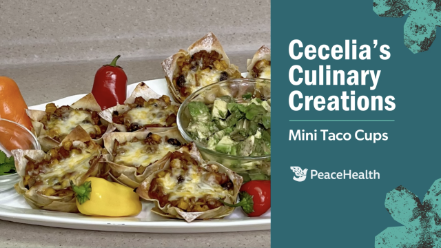 Mini taco cups on a plate with fresh peppers