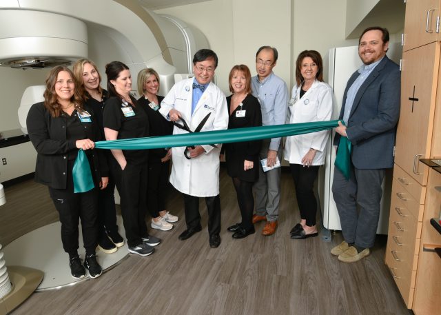 PeaceHealth St. John Medical Team cutting ribbon on new True Beam linear accelerator