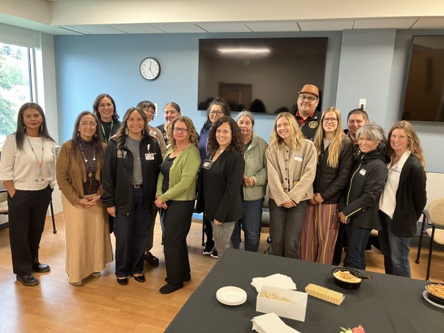 Monica Revey (left) and Katrina Juarez (front row, third from left) were joined by PeaceHealth and Tribal leaders and caregivers at the anniversary gathering.