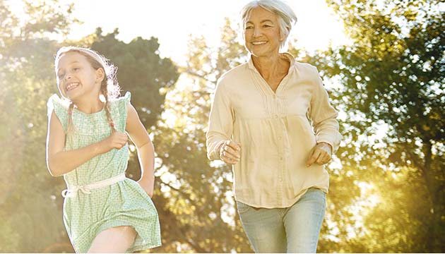 young girl running with woman