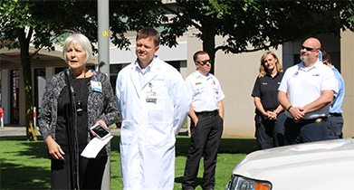 PeaceHealth providers and security standing outside of a medical facility