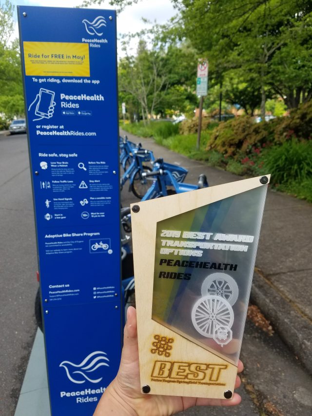 Photo of "PeaceHealth Rides" bicycle stand