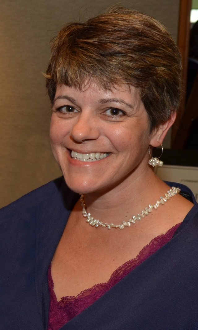 Candid photo of smiling Karen Santangelo