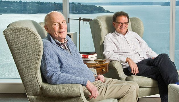 Alec Brindle Sr and Alec Brindle Jr relax in their home in Seattle