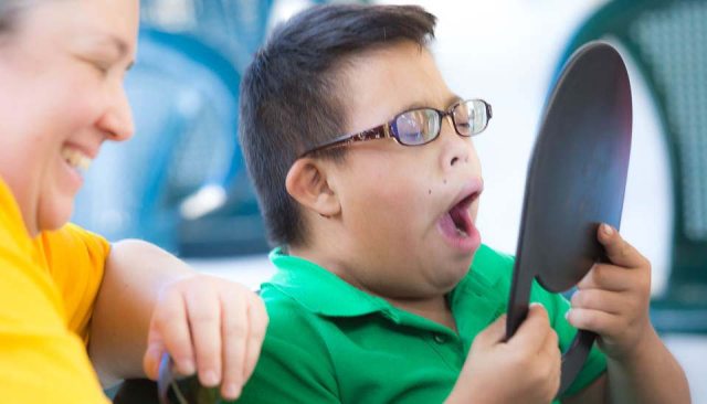 young boy wowed by new eyeglasses