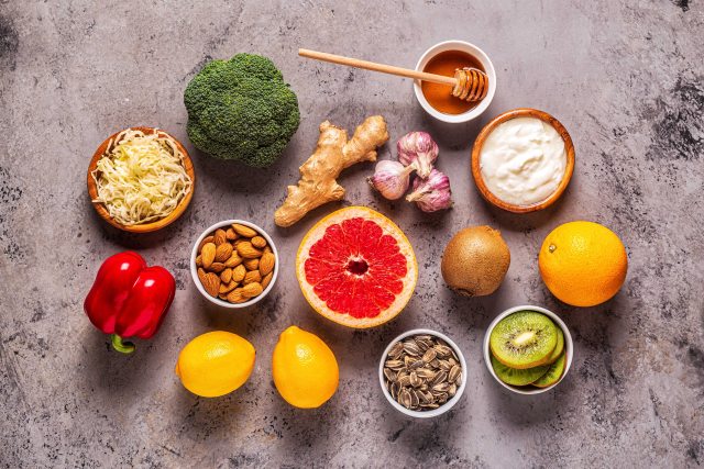 Various spices and vegetables in individual bowls prepared for a recipe