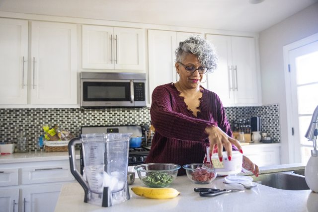 Woman making a smoothie