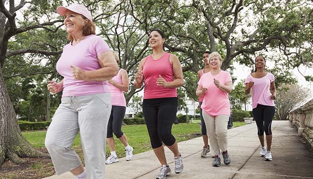 group of women walking for exercise outside