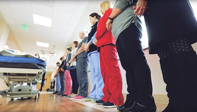caregivers gather in hall to honor patient donor