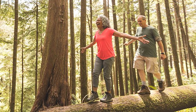 couple walking in the woods